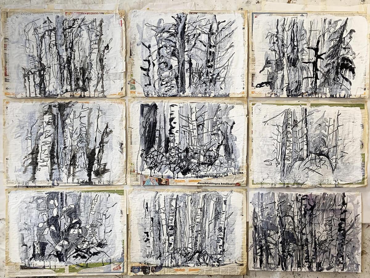 9 drawings on newspaper